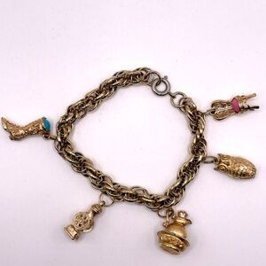 Avon Signed Vintage Gold Tone Five Charm Bracelet
